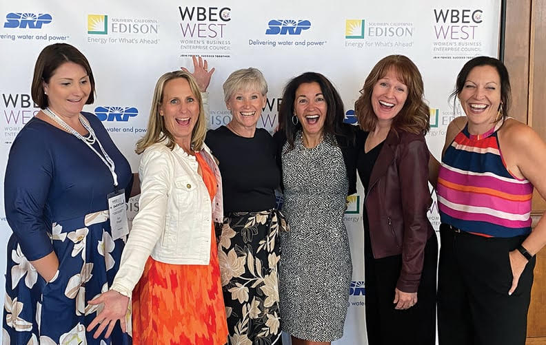 Whitney Luckett with members of WBEC-West, including Erin Dougan, Karen Hertz, Karen Posey, Maureen “Mo” Berkner Boyt and Dree Ziegler